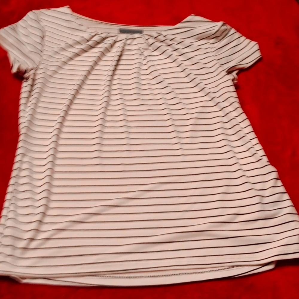 Black and white, crew neck blouse.